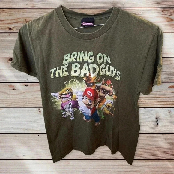 NINTENDO SIZE SMALL GREEN TEE WITH BRING ON THE BAD GUYS - Picture 1 of 2